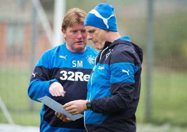 Rangers manager Stuart McCall, left, speaks to Ian Durrant during a training session on Friday. Picture: SNS