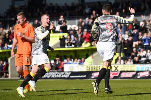 St Mirren's Steven Thompson (right) celebrates scoring his second penalty of the game. Picture: SNS