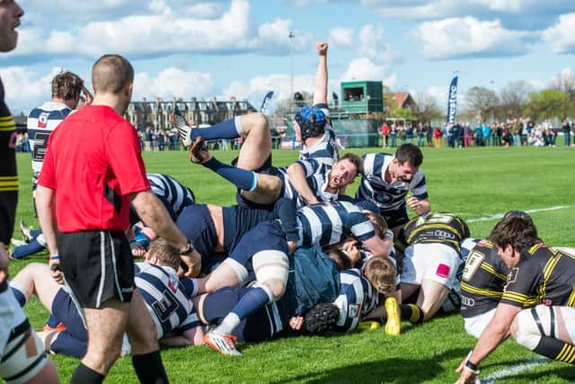Jason Hill, at the bottom of a pile of bodies, scores the winning try. Picture: Ian Georgeson