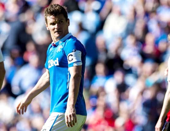 Rangers captain Lee McCulloch cuts a dejected figure after being the subject of jeers from the stands. Picture: SNS