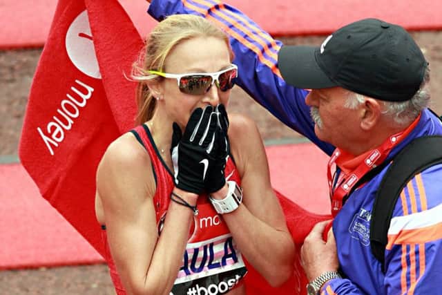 An emotional Paula Radcliffe finishes her last ever London Marathon yesterday. Picture: AFP/Getty
