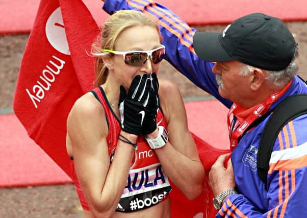 An emotional Paula Radcliffe finishes her last ever London Marathon yesterday. Picture: AFP/Getty