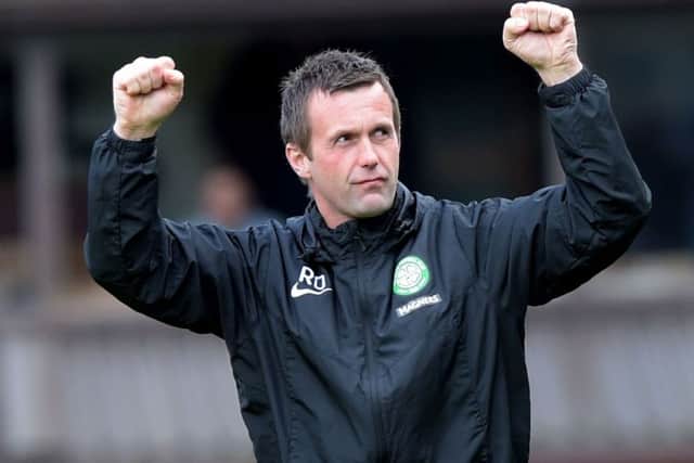 Ronny Deila celebrates Celtic's win at Dundee United. Picture: SNS