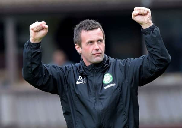 Ronny Deila celebrates Celtic's win at Dundee United. Picture: SNS