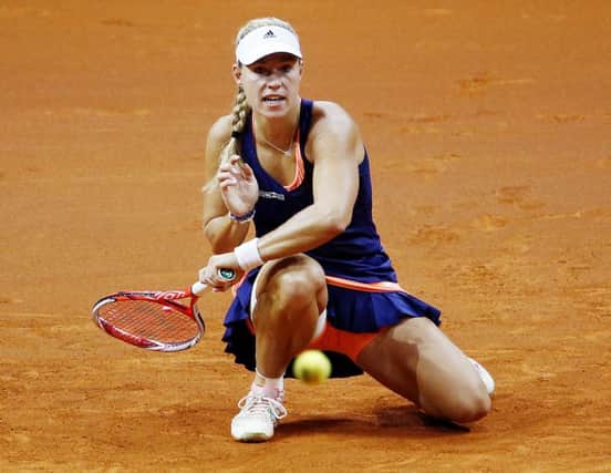 Angelique Kerber hits an unorthodox forehand on her way to a 3-6, 6-1, 7-5 final triumph. Picture: AP