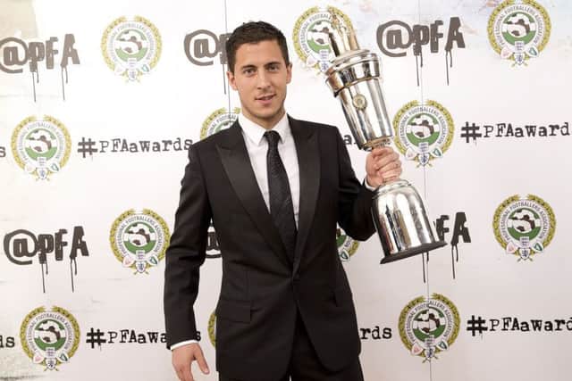 Eden Hazard picks up his trophy at the Grosvenor House Hotel in London. Picture: PA
