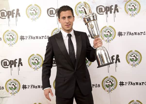 Eden Hazard picks up his trophy at the Grosvenor House Hotel in London. Picture: PA