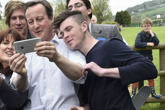 David Cameron takes a selfie with supporters while campaigning in Norton Sub Hamdon. Picture: Getty