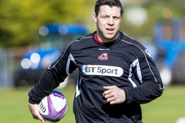 Edinburgh Rugby's Alasdair Dickinson gets on the ball at training. Picture: SNS Group