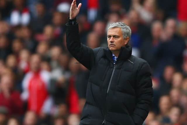 Jose Mourinho urges his side on in a key game against Arsenal and Chelsea match at Emirates Stadium. Picture: Getty Images