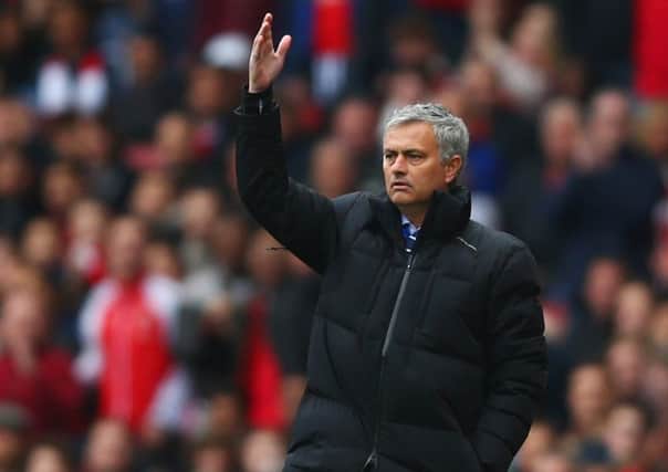 Jose Mourinho urges his side on in a key game against Arsenal and Chelsea match at Emirates Stadium. Picture: Getty Images