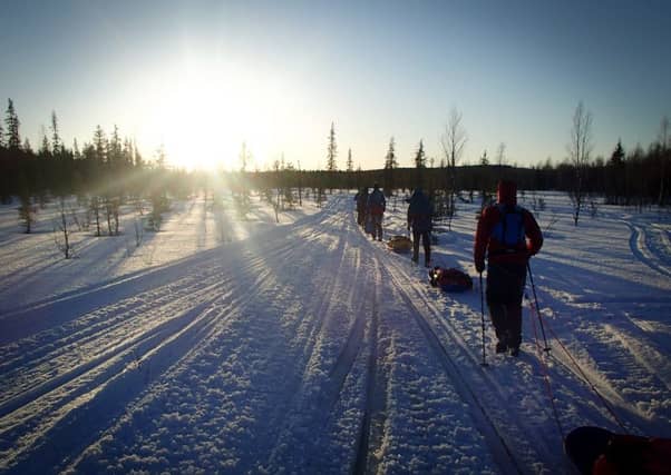 The trekkers in single file pulling their pulks. Picture: Contributed