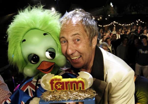 Keith Harris with Orville. Picture: PA