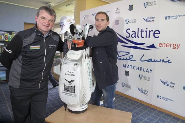 Paul Lawrie, left, publicises his new match-play event with the help of Aberdeen captain Russell Anderson. Picture: Kenny Smith