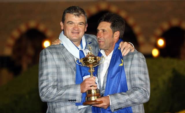 Lawrie with captain Jose Maria Olazabal after helping Europe win the Ryder Cup in 2012. Picture: Getty