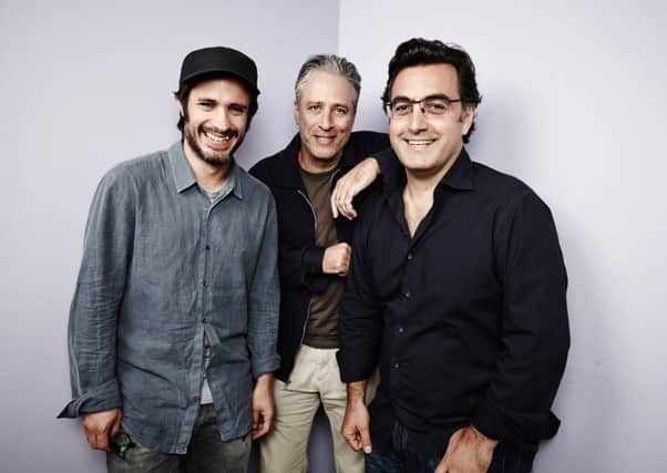 (Left to right) Actor Gael Garcia Bernal, director/writer Jon Stewart and source author Maziar Bahari in Toronto. Picture: Getty Images