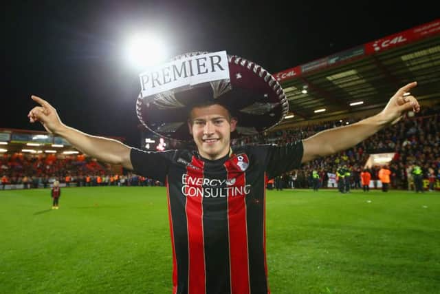 Ryan Fraser celebrates after win over Bolton put Bournemouth on the brink of the Premier League. Picture: Getty
