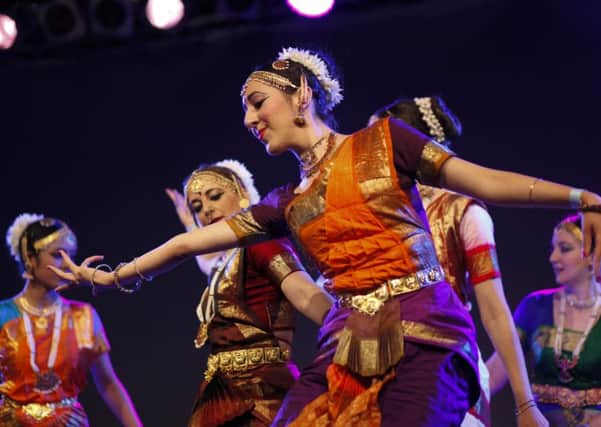 Students from The Ihayami dance school show their stuff at the 2014 Edinburgh Mela comes on Leith Links. Picture: Toby Williams