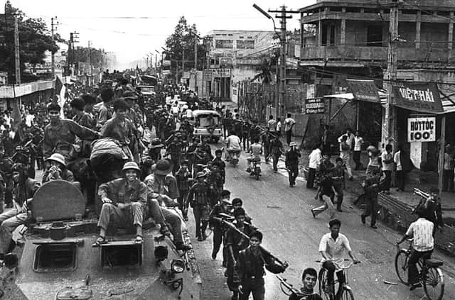 Communist troops head for the centre of Saigon on this day in 1975 as the Vietnam war finally came to an end. Picture: AFP