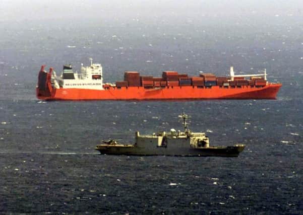 A cargo ship, not pictured, carrying a crew of 24 men, including a Briton, has been stopped by Iranian authorities on the Strait of Hormuz. Picture: AP