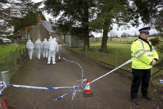 Forensics officers at the scene of the crime. Picture: Perthshire Picture Agency (PPA)