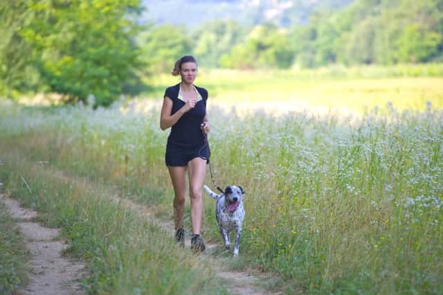 Going out for a run or exercising the dog are ideal activities for the Apple Watch to monitor. Picture: Getty