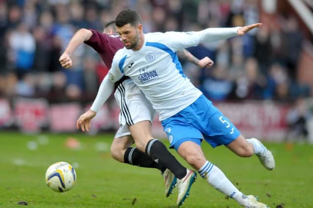 Queen of the South's Mark Durnan. Queens' supporters, unlike some of their promotion rivals, will be made to pay to watch play-off games. Picture: Jane Barlow