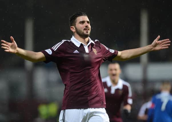 Hearts' 

Alim Ozturk is one of six Tynecastle players in the Team of the Year. Picture: Neil Hanna