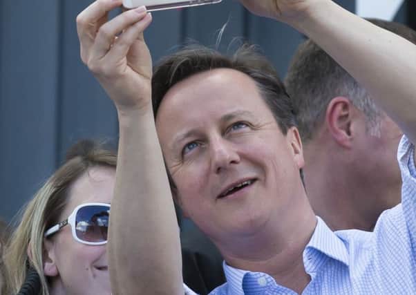 David Cameron takes a selfie in Yorkshire. Picture: AP