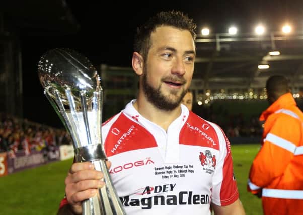Scotland captain Greig Laidlaw with the European Challenge Cup trophy after defeating his former club, Edinburgh, at The Stoop. Picture: PA