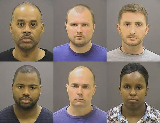 Baltimore police officers (top row from left, Caesar Goodson, Garrett Miller, Edward Nero, (bottom row from left) William Porter, Brian Rice and Alicia White. Picture: AP