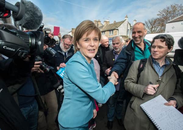 First Minister Nicola Sturgeon joins SNP Edinburgh East candidate George Kerevan on the campaign trail in Musselburgh. Picture: Andrew O'Brien