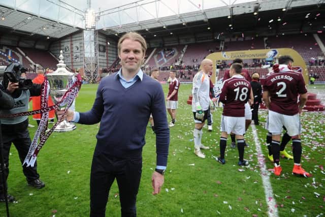 Hearts boss Robbie Neilson with the Championship trophy. Picture:

 Neil Hanna