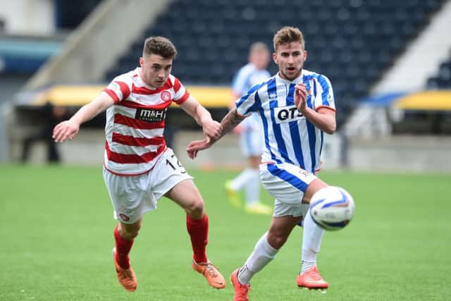Kilmarnock's Craig Slater is closed down by Darren Lyon (left). Picture: SNS Group