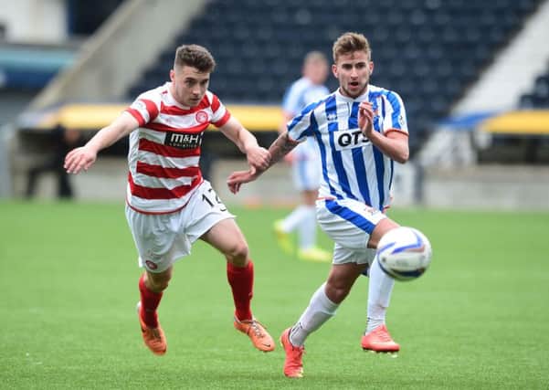 Kilmarnock's Craig Slater is closed down by Darren Lyon (left). Picture: SNS Group