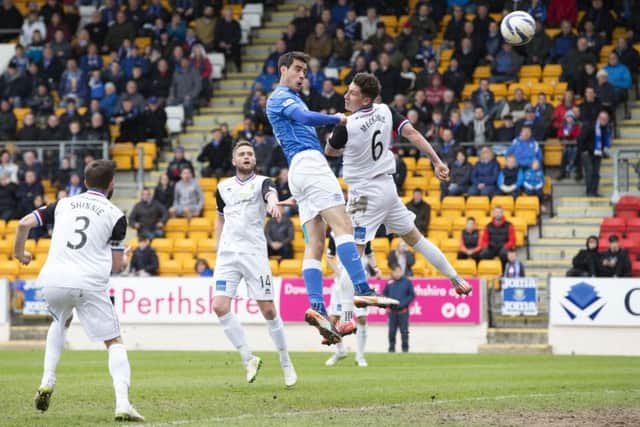 St Johnstone's Brian Graham (centre) heads home the equaliser against Inverness CT. Picture: SNS Group