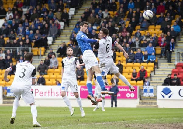 St Johnstone's Brian Graham (centre) heads home the equaliser against Inverness CT. Picture: SNS Group