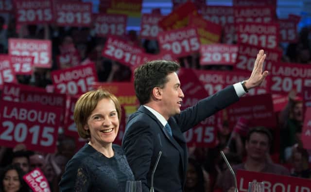 Ed Miliband waves to supporters at the Royal Horticultural Halls in London, with his wife Justine, yesterday. Picture: PA