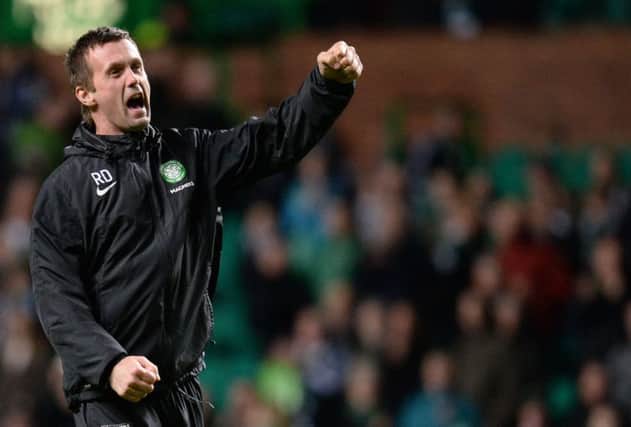 Ronny Deila celebrates a victory in his now customary manner. Picture: SNS