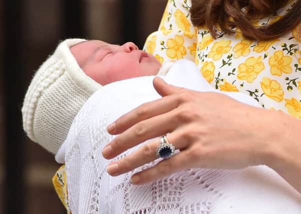 Catherine, Countess of Strathearn holds her newly-born daughter born on Saturday. Picture: AFP/Getty Images
