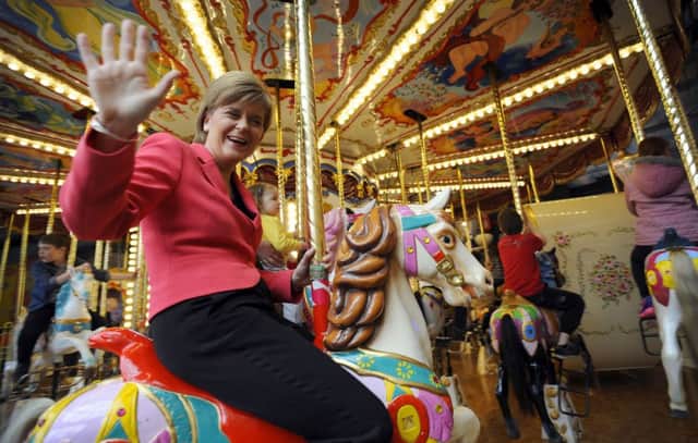 Nicola Sturgeon at M and Ds theme park in Motherwell yesterday. Picture: Getty