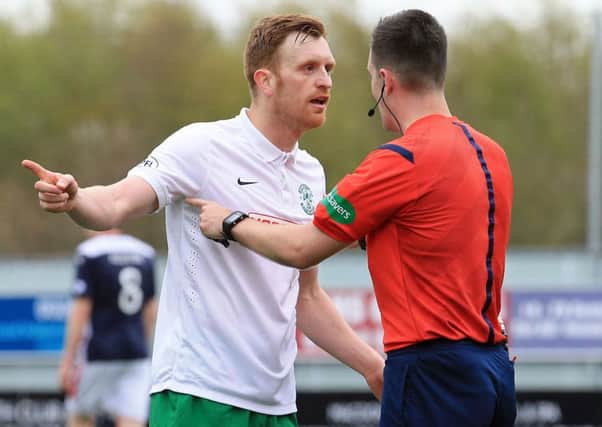 Hibs skipper Liam Craig confronts referee Don Robertson during the Falkirk v Hibernian match on 2nd May 2015. Picture: Gordon Fraser