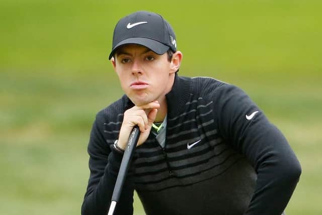 Rory McIlroy lines up his putt on the third hole during his semi-final win over Jim Furyk. Picture: Getty