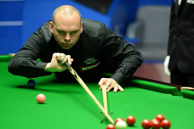 Stuart Bingham plays a shot during yesterdays evening session in the final against Shaun Murphy. Picture: PA