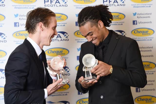 Stefan Johansen (left) joins young player of the Year Jason Denayer. Picture: SNS