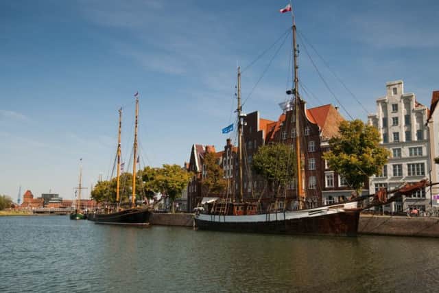 Traditional ships and buildings on the Trave. Picture: PM