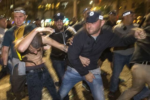 A protester is set on by police during the Tel Aviv protest. Picture: Getty