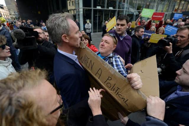 A protester confronts Scottish Labour leader Jim Murphy. Picture: Hemedia