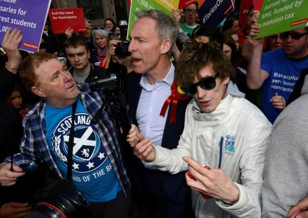 Jim Murphy is surrounded by protesters in Glasgow. Picture: Hemedia
