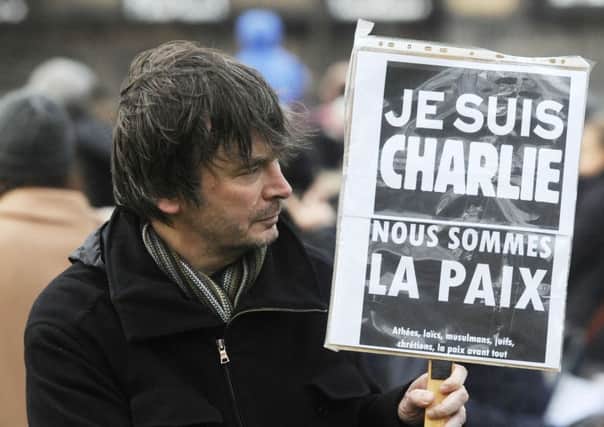 The Charlie Hebdo tragedy showed the world the kind of threats media members around the world have to deal with. Picture: Greg Macvean